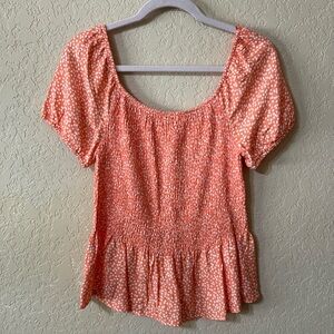 Coral polka dot peplum top size large
